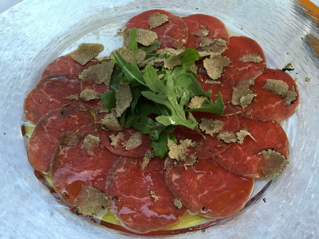 Carpaccio from beef filet, marinated in lemon and olive oil with fresh sliced Burgundertruffles.