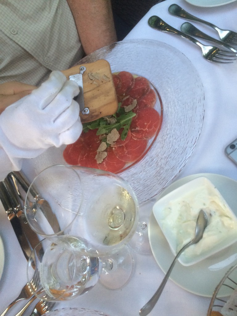 Carpaccio from beef filet, marinated in lemon and olive oil with fresh sliced Burgundertruffles.