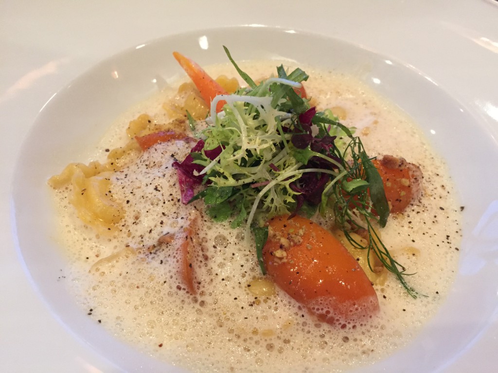 Eur 23 - Mountain cheese ravioli with marinated apricots and roasted nuts